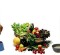 dog eating cat standing veggies in middle